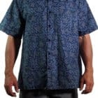 men's fashion short sleeved shirt casual box cut in 100% cotton printed with a design depicting grey turtles made out of sea shells on a navy blue background